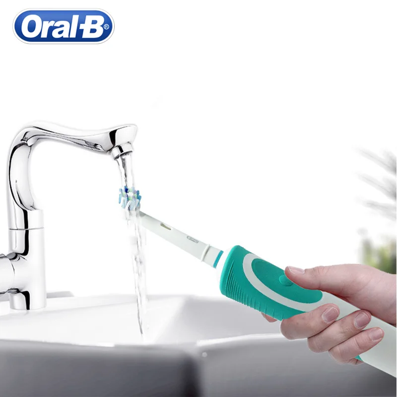 Фото Вращающаяся электрическая зубная щетка Oral B Vitality D12S перезаряжаемые насадки Вращающаяся электрическая зубная щетка Oral B Vitality D12S перезаряжаемые насадки